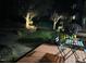 Charming back deck and patio area offers a tranquil and private space to relax and enjoy the evening at 308 Sutton Glen Dr, Apex, NC 27523
