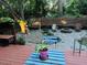 Beautiful backyard offers a firepit, charming swing, and plenty of space for outdoor activities and entertaining at 308 Sutton Glen Dr, Apex, NC 27523