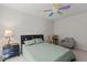 Bedroom with natural light, neutral colored walls, a desk and sitting chair at 308 Sutton Glen Dr, Apex, NC 27523