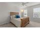 Bedroom featuring a ceiling fan, natural light, and neutral-toned walls at 308 Sutton Glen Dr, Apex, NC 27523