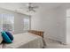 Bedroom featuring a ceiling fan, natural light, and neutral-toned walls at 308 Sutton Glen Dr, Apex, NC 27523