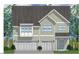 Charming two-story home with a two-car garage and inviting facade showcasing classic architectural elements at 346 N Maple Walk Dr # 243, Garner, NC 27529