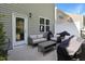 Outdoor patio features comfortable seating, a grill, and easy access to the house, great for gatherings at 3636 Water Mist Ln, Raleigh, NC 27604