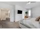 Cozy primary bedroom with neutral tones, carpet, and plenty of natural light at 3636 Water Mist Ln, Raleigh, NC 27604