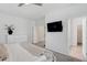 Spacious main bedroom featuring a TV and a walk-in closet at 3636 Water Mist Ln, Raleigh, NC 27604