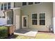 Backyard view of townhome featuring fenced-in patio with access door, and multiple windows at 3810 Prince Noah Loop, Wake Forest, NC 27587