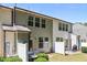 View of back of townhome featuring a patio with privacy fence and plenty of windows at 3810 Prince Noah Loop, Wake Forest, NC 27587