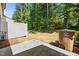 Backyard view of a patio and tree line at 3810 Prince Noah Loop, Wake Forest, NC 27587