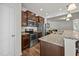 Modern kitchen with stainless steel appliances and granite countertops at 3810 Prince Noah Loop, Wake Forest, NC 27587