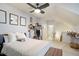 Bedroom with ceiling fan, open closet, and ensuite bathroom access at 4203 Overcup Oak Ln, Cary, NC 27519