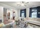 Bright living room with hardwood floors, comfortable sofas, and elegant decor at 4203 Overcup Oak Ln, Cary, NC 27519