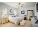 Serene main bedroom with natural light, neutral colors, and stylish furnishings at 4203 Overcup Oak Ln, Cary, NC 27519