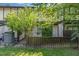 View of the building from the backyard with beautiful landscaping and flowering trees at 4305 Lake Ridge Dr, Raleigh, NC 27604