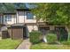 Charming townhouse featuring neutral tones, a fenced front yard, and a walkway leading to the entrance at 4305 Lake Ridge Dr, Raleigh, NC 27604
