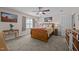 Cozy bedroom features a ceiling fan and a window with natural light at 545 Olivia Way, Selma, NC 27576