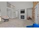 Spacious living room features vaulted ceiling, fireplace, and open access to the second story at 545 Olivia Way, Selma, NC 27576