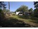 Spacious backyard with a deck and partial fence, great for outdoor activities at 606 E Club Blvd, Durham, NC 27704