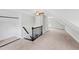 Finished attic room with carpeted floors and a door leading to the deck at 625 New Road Rd, Raleigh, NC 27608
