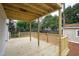 Beautiful outdoor deck featuring wood and covering for outdoor entertaining at 625 New Road Rd, Raleigh, NC 27608