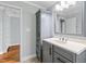 Bathroom vanity featuring storage and a neutral countertop at 625 New Road Rd, Raleigh, NC 27608