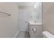 Bright bathroom featuring a single vanity, large mirror, and ample lighting, designed for comfort and functionality at 705 Churton Pl, Cary, NC 27518