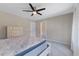Inviting bedroom featuring soft carpet, a ceiling fan, and ample space, offering a comfortable and peaceful atmosphere at 705 Churton Pl, Cary, NC 27518