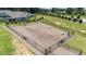 Community dog park with benches, waste stations, and gravel ground cover is fully fenced at 705 Churton Pl, Cary, NC 27518