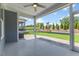 Relax on this screened porch with ceiling fan and enjoy views of the well-maintained lawn and manicured landscaping at 705 Churton Pl, Cary, NC 27518
