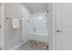 This bathroom features a tiled shower with a glass door and a built-in seat at 705 Churton Pl, Cary, NC 27518