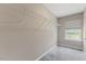 Functional walk-in closet with wire shelving and a window, providing ample storage and natural light at 705 Churton Pl, Cary, NC 27518