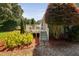Back exterior view of home with deck, stairs and landscaping at 73 Richmond Dr, Archer Lodge, NC 27527