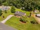 Charming single-story home with lush greenery and a well-maintained front yard at 73 Richmond Dr, Archer Lodge, NC 27527