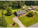 Charming single-story home with lush greenery and a well-maintained front yard at 73 Richmond Dr, Archer Lodge, NC 27527