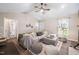 Cozy living room with vaulted ceiling, stylish decor, and a comfortable sectional sofa at 73 Richmond Dr, Archer Lodge, NC 27527