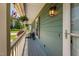 Inviting porch view with seating, decor, and a glimpse of the well-maintained front lawn at 73 Richmond Dr, Archer Lodge, NC 27527