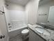 Bathroom featuring a single sink, granite countertop, and a shower-tub combo at 78 Mineral Springs Way, Benson, NC 27504