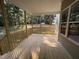 The home has a cozy wooden porch with wooden railings perfect for enjoying a beautiful outdoor view at 78 Mineral Springs Way, Benson, NC 27504