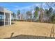 A large, private backyard with an enclosed porch, offering a serene outdoor space at 78 N Porcenna Ln, Clayton, NC 27527