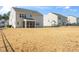 A spacious backyard, ideal for recreation, complements the home with a screened porch at 78 N Porcenna Ln, Clayton, NC 27527