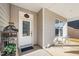 Inviting front porch with seating area and charming decor at 78 N Porcenna Ln, Clayton, NC 27527