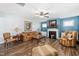 Cozy living room featuring a fireplace, plush seating, and warm lighting for a comfortable atmosphere at 78 N Porcenna Ln, Clayton, NC 27527
