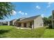 A well-manicured lawn offers a lovely backyard and patio at 7807 Braefield Dr, Raleigh, NC 27616