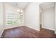 Dining room shows hardwood floors, crown moulding, and chandelier at 8007 Crookneck Dr, Angier, NC 27501