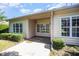 Covered patio area with lush greenery and natural light providing a peaceful spot at 8007 Crookneck Dr, Angier, NC 27501
