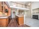 Kitchen features stainless steel appliances, hardwood floors, and an open layout at 8007 Crookneck Dr, Angier, NC 27501