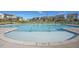 Community pool with sun loungers, umbrellas, and panoramic views of the neighborhood homes at 817 James J Freeland Memorial Dr, Hillsborough, NC 27278