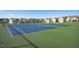 Tennis courts and neighborhood homes for active residents to enjoy the outdoor facilities at 817 James J Freeland Memorial Dr, Hillsborough, NC 27278