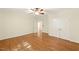 Spacious bedroom with hardwood floors, ceiling fan, and closet at 83 Calabria Ct, Clayton, NC 27527