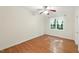 Bedroom with hardwood floors, ceiling fan, and natural light at 83 Calabria Ct, Clayton, NC 27527