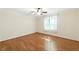 Bedroom with hardwood flooring and a window providing natural light at 83 Calabria Ct, Clayton, NC 27527